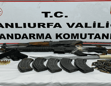 siverekte_cok_sayida_silah_ele_gecirildi_h49153_1cf54
